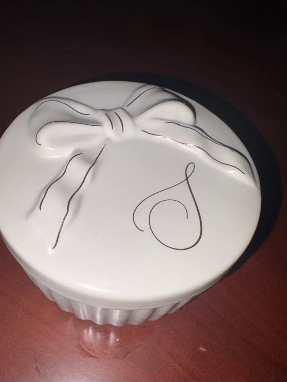 White Ceramic Lidded Jar with Bow Accent